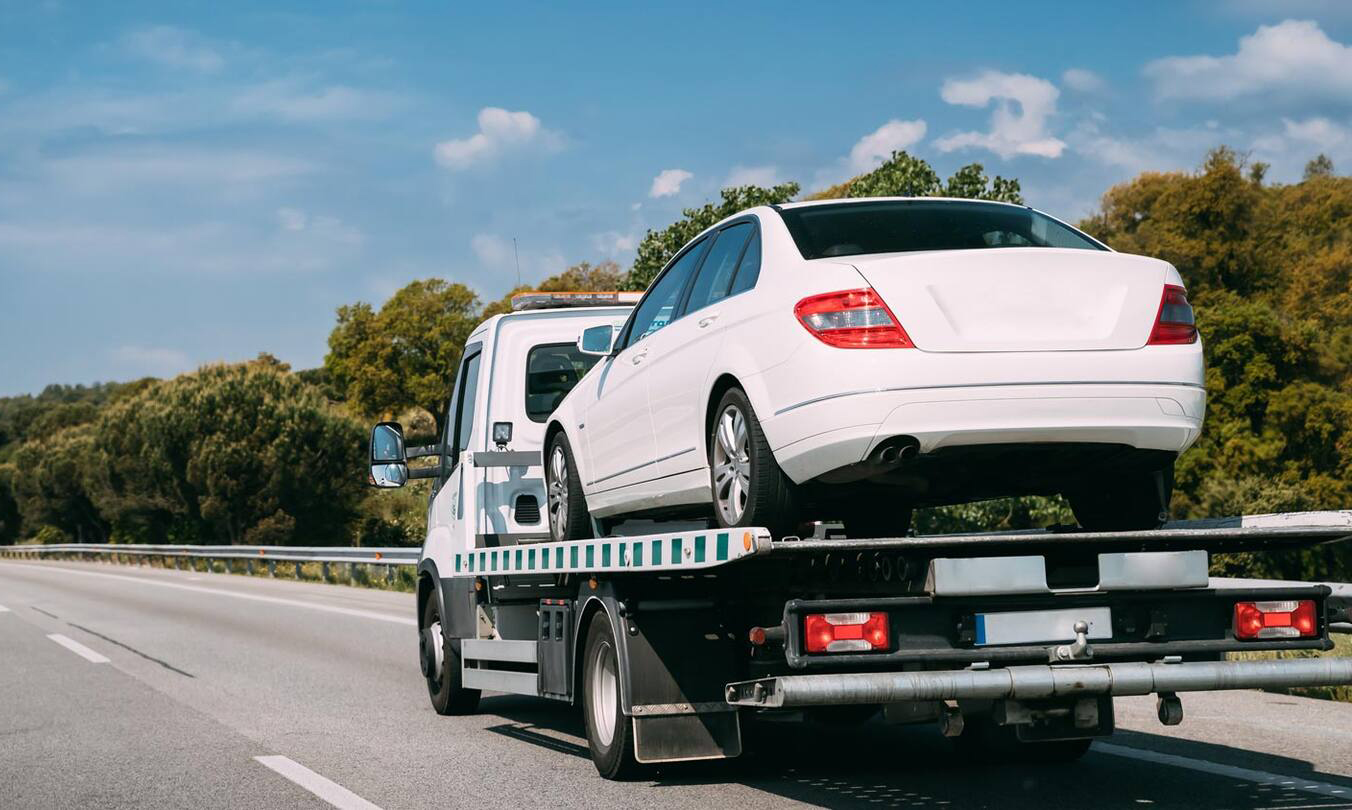 tow-truck-transporting-car